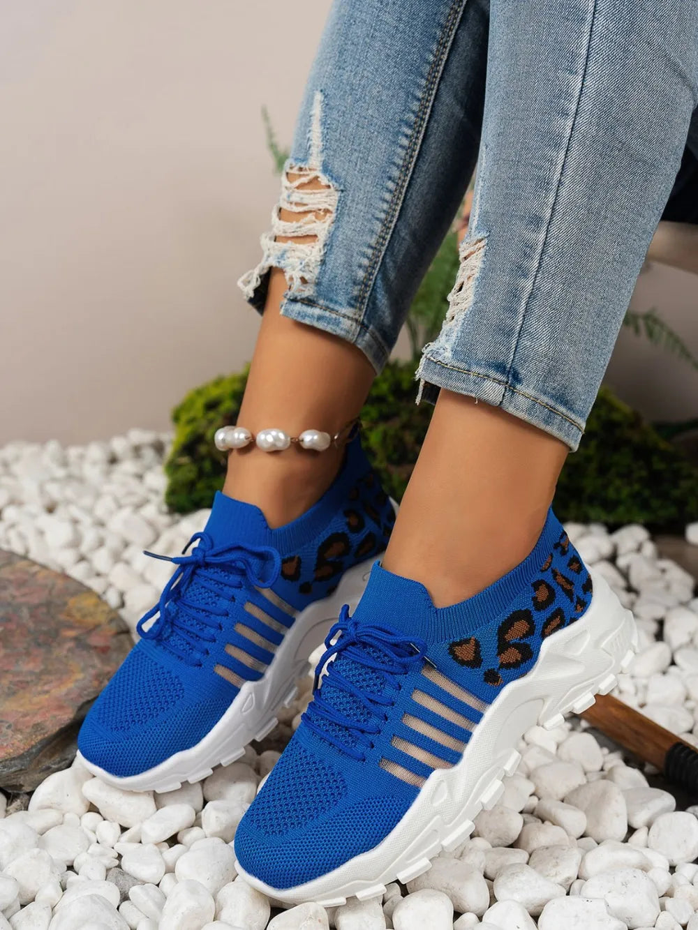 Royal blue leopard mesh shoe side view with cutout panels