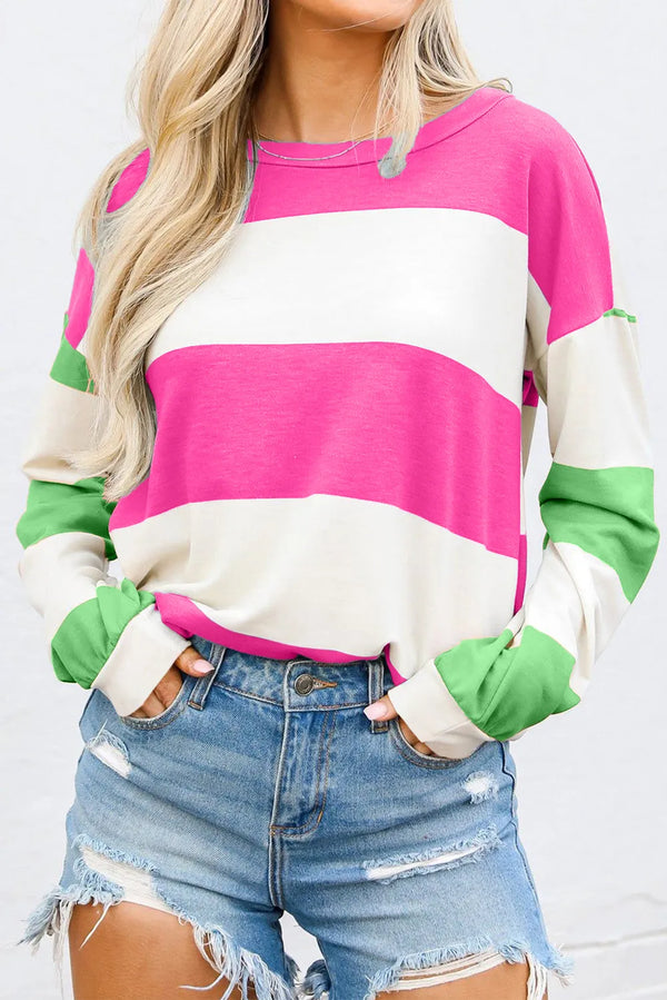Person wearing striped sweater on white background